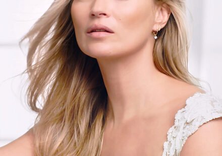 Kate Moss poses nude except for fake fur in stunning cavewoman