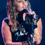 Miley Cyrus strips down to her underwear and grinds on shirtless