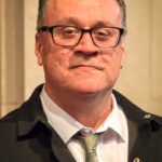 Russell T Daviess longtime producing partner reveals why shes